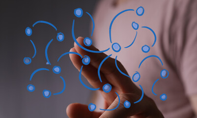 Hand interacting with a futuristic digital network, symbolizing global connectivity, data exchange, and innovative technology. Ideal for future