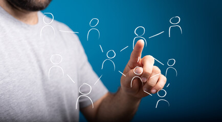 Image of a hand interacting with a network of people, symbolizing connection and communication.