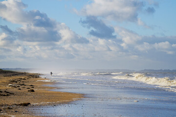 Waves on the Lingreville beach in Normandy coast