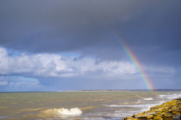 Rainbow in the Pointe d'Agon in Normandy coast