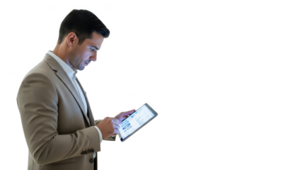 A man in a suit holding a tablet with a blank screen, against transparent background