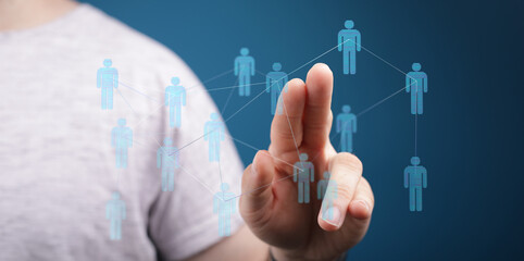 Person connecting with digital human icons, illustrating concept of social connections, networking, and digital transformation.