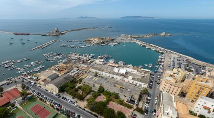 Canvas schilderij  Aerial view of houses and buildings in the historic center of Trapani, Sicily, Italy. It is a beautiful city overlooking the Mediterranean Sea. The Aegadian Islands are in the background.  © Stefano Tammaro