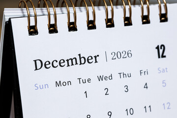 December 2026 monthly calendar page close up, minimal design planner showing days of the week and dates for time management and organization concept