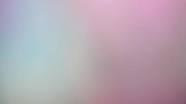 Una toma de cerca de un fondo abstracto de varios colores  con un degradado ligero desenfocado en movimiento