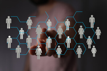 Abstract image of hand touching futuristic network concept representing teamwork, communication, and digital connections