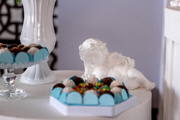 Guardian angel statue in baptism decoration.