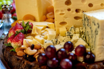 Charcuterie board with cheese, fruits and grains