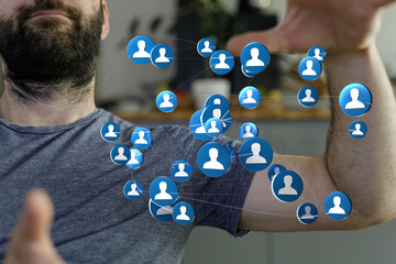 Close-up of a man interacting with digital social network and user profile icons, representing networking and connection concepts