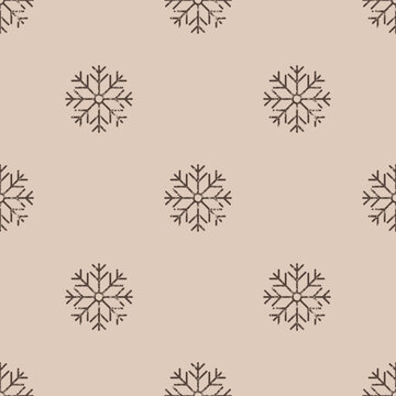 Seamless Christmas pattern. Grunge grainy snowflake texture. Festive endless vintage print. New Years flat vector. For textile, wallpaper, wrapping design. Dark snowflakes on beige background.