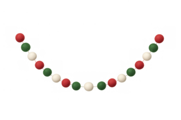 Christmas felt ball garland hanging, festive holiday decoration, red green and white christmas ornaments on transparent background