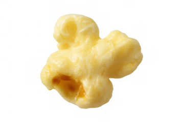 Single popped corn kernel covered in butter, representing a classic salty treat for cinema, parties, or home enjoying
