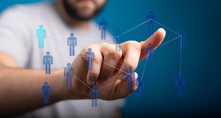 Human hand interacting with a digital interface representing a social network, business network, and communication concept.