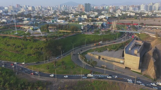 Aerial perspective of cars driving along the bajada balta road in miraflores, lima, peru