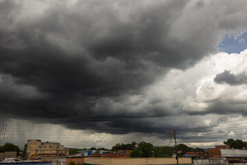 Dark storm clouds before a thunder-storm in the town