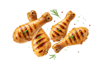 Four plump chicken drumsticks, grilled golden-brown with char marks & glossy glaze, garnished with parsley & rosemary, levitating against a transparent background. High-impact food advertising