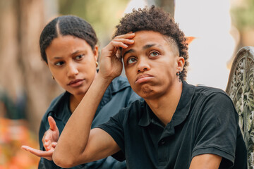 angry young couple arguing and enduring anger