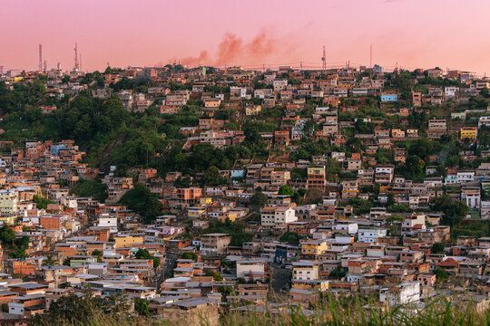 Brazilian Hillside Neighborhood – Colorful Houses in a Favela, Urban Density, and Community Architecture under Warm Sunset Sky, Slum - Powered by Adobe