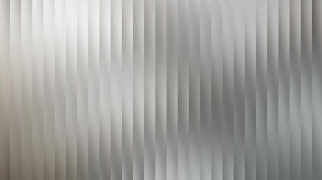 Abstract background of vertical gray and white blinds with soft light and shadow creating a textured pattern