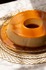 Condensed Milk Pudding, a smooth and creamy dessert made with condensed milk, eggs, and caramel, baked until golden and served chilled. 