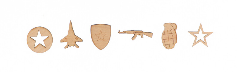Soviet military wooden symbols of February 23 isolated on white background