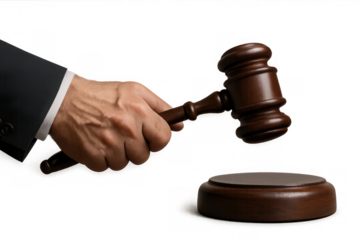 Judge's hand holding gavel hitting sounding block, representing justice, law, and auction decision, transparent background