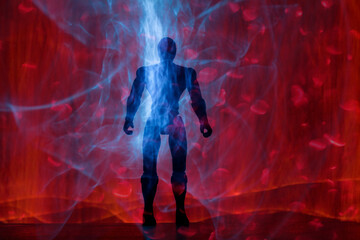 Mysterious humanoid figure emerging from glowing purple and orange energy waves