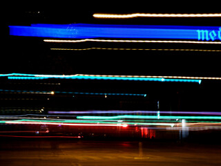 malowane światłem, rozmyte światła miasta na nocnym niebie, abstarct background of colored lights, long exposure, light painting city light in night  © kateej