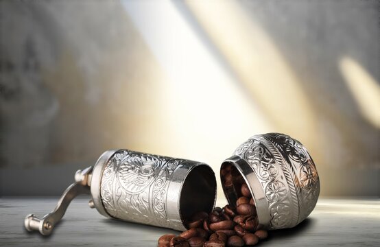 Old metal bowl with aroma coffee beens