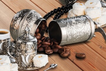 Old metal bowl with aroma coffee beens