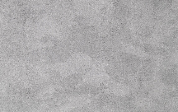 Faux grey Suede texture background, Alcantara texture use on premium computer notebook. Surface of leatherette for textured background.