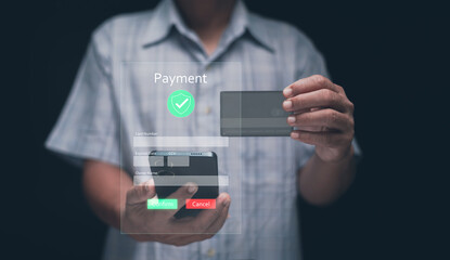 Concept of online payment and digital finance. Person holding smartphone and credit card with holographic interface. E-commerce transaction, security, fintech and modern banking technology.