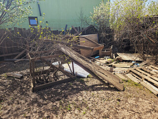 Stormy Backyard Aftermath with Debris Clean-Up Task Ahead. 