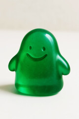 Green translucent smiling figure on white background