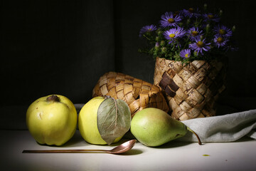 Bonuses of nature and the fruits of human labor—vegetables and fruits—are laid out on the table.