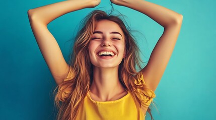 Fototapeta premium Cheerful blonde girl in yellow top laughing and posing playfully. Colorful studio background, joyful energy and youthful confidence