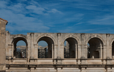 Fototapeta premium Arches of Coliseum in Arles France on A sunny Day 