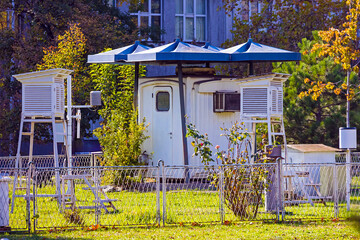 A weather research station facility equipped with instruments to measure atmospheric conditions on city street