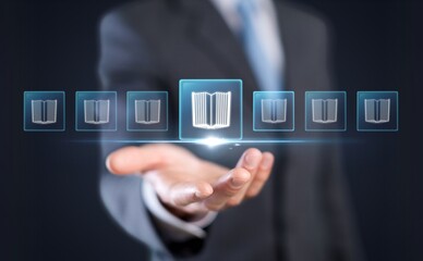 A person holds digital book icons for virtual library concept