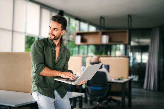 Software engineer using laptop computer with global network connection, Technology, innovation