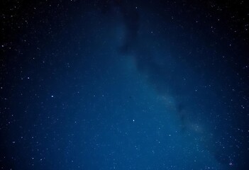 Obraz premium Vast, glittering night sky; Milky Way stretches across, countless stars , mysterious, cosmos