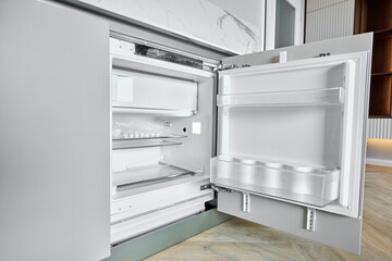 Fototapeta premium Modern refrigerator with open doors showcasing organized interior and sleek design features
