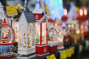 Christmas lanterns and snow globes creating holiday atmosphere