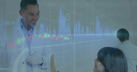 Talking physician in lab coat explaining chart overlay to woman in clinic with otoscope, copy space