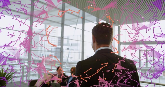 Presenting Asian man wearing suit explaining growth in office lounge, with laptop, network graphic