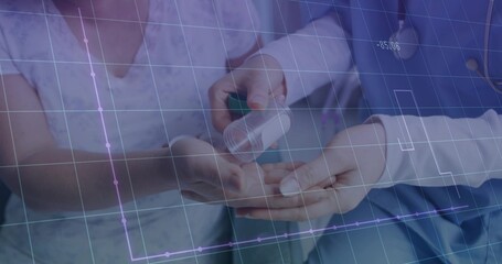 Dispensing doctor pouring pills from pill bottle into patient hand in clinic, with stethoscope