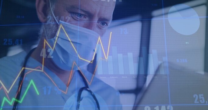 Reviewing doctor in scrubs viewing patient data in exam room, with stethoscope, charts, copy space