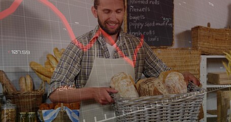 Man behind bakery counter arranging baked loaves into wicker basket, with financial graph overlay