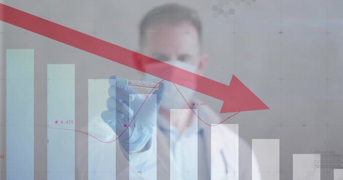 Holding vaccine vial wearing blue gloves scientist showing declining red arrow and bars in lab