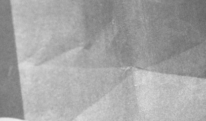 Grey damaged paper texture, folded, Rough Grunge Shabby Scratched Torn Ripped Texture. Distressed Overlay Surface for Collage or design. High Quality scan